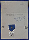SS 12 YEAR SERVICE MEDAL WITH LETTER OF PROVINANCE FROM REICHSCHANCELLORY.