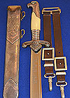 RAD OFFICRS DAGGER BY WUSTHOF WITH LEATHER HANGERS.