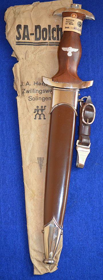 MINT UNISSUED SA DAGGER BY HENCKELS WITH ORIGINAL ISSUE TAG AND PAPER BAG.