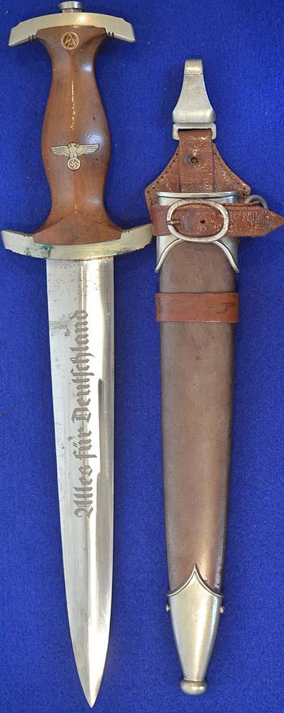 SA DAGGER 1933 MODEL BY UNDINE WITH UNIT ISSUE STAMPS AND RARE BROWN LEATHER FROG VERTICAL HANGER.