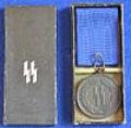 CASED SS 4 YEAR MEDAL.