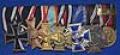 PARADE MOUNTED SET OF EIGHT WW1 AND NSDAP MEDALS.