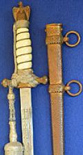 THIRD REICH NAVAL OFFICERS DAGGER 1938 MODEL BY WKC WITH HAMMERED SCABBARD AND KNOT.