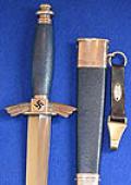THIRD REICH NSFK FLYERS DAGGER BY GEBR HELLER WITH UNUSUAL ISSUE STAMPS.