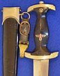 SS DAGGER 1933 MODEL BY HERDER COMPLETE WITH HANGER.