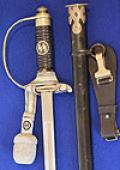 SS OFFICERS SWORD COMPLETE WITH SS KNOT AND HANGER, NEAR MINT CONDITION.