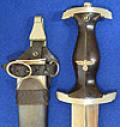 SS 1933 MODEL DAGGER WITH GROUND ROHM INSCRIPTION BY KLASS COMPLETE WITH VERTICAL HANGER.