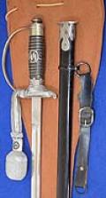 SS OFFICERS SWORD COMPLETE WITH SS KNOT, HANGER AND SWORD BAG, A SUPERB COMPLETE SET.