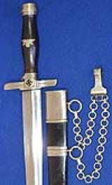 POSTSCHUTZE LEADERS DAGGER BY WAYERSBERG WITH DRP ISSUE STAMPS AND CHAIN HANGER.