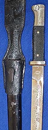 A  RARE THIRD REICH ARMY PIONEER MODEL PARADE BAYONET WITH ENGRAVED BLADE.