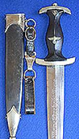 SS DAGGER 1933 MODEL BY RARE MAKER ED GEMBRUCH COMPLETE WITH HANGER AND BELT LOOP.