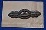NAVAL U.BOAT COMBAT CLASP IN BRONZE WITH PAPER PACKET OF ISSUE.