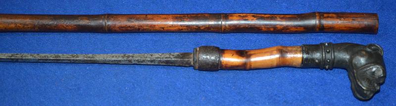 VICTORIAN SWORD STICK WITH BRONZE DOG HEAD POMMEL.