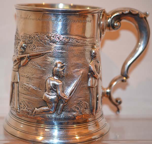 ENGLISH HALLMARKED SILVER TANKARD PRESENTED TO THE DEVON RIFLE VOLUNTEERS AND DECORATED WITH THREE SOLDIERS.