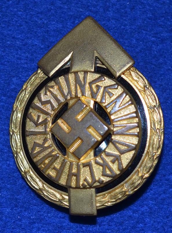 HITLER YOUTH LEADERS SPORTS BADGE WITH ISSUE NUMBER.
