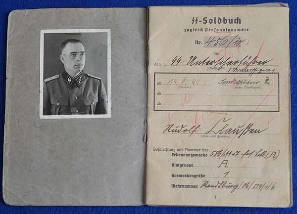 WAFFEN SS OFFICERS SOLDBUCH WITH SUPERB UNIFORM PHOTOGRAPH.