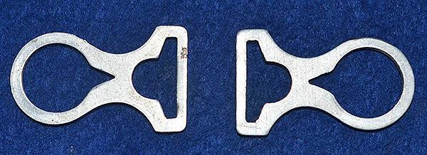 PAIR OF POLICE SHAKO CHIN STRAP FITTINGS.