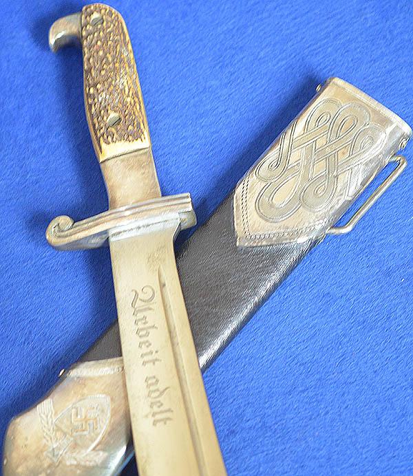 RAD DAGGER BY KREBS WITH UNUSUAL LEATHER SCABBARD.