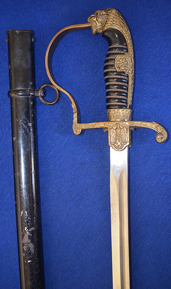 ARMY OFFICERS LIONS HEAD SWORD BY PACK.