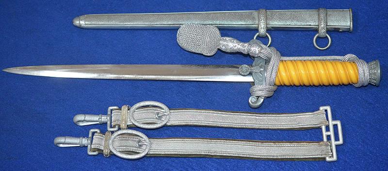 GERMAN ARMY OFFICERS DAGGER BY WKC COMPLETE WITH STRAPS AND KNOT.