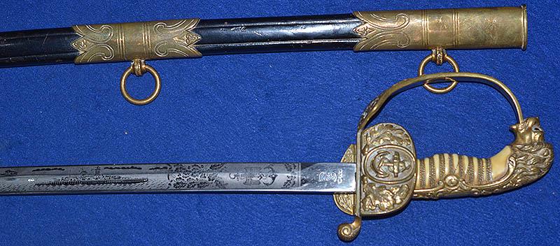 THIRD REICH NAVAL OFFICERS SWORD BY WKC WITH EXTREMLY RARE U-BOAT DECORATED ETCHED BLADE.