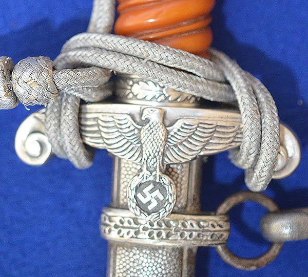 GERMAN WW2 ARMY OFFICERS DAGGER BY ALCOSO COMPLETE WITH HANGERS AND KNOT.