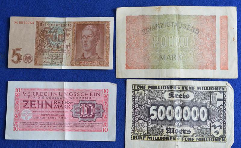 COLLECTION OF FOUR GERMAN BANK NOTES.