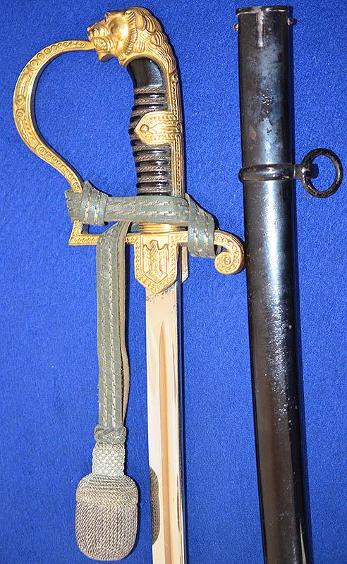 THIRD REICH LIONS HEAD ARMY OFFICERS SWORD BY EICKHORN,COMPLETE WITH KNOT.