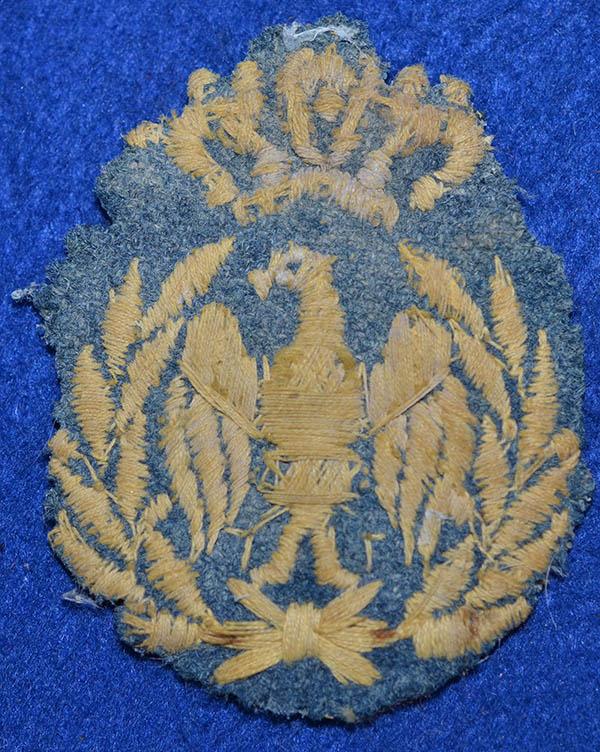 ITALIAN WW2 CAP BADGE.