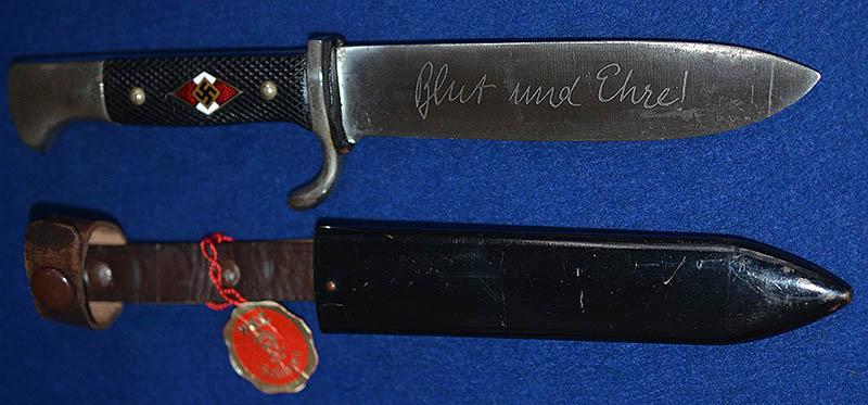 HITLER YOUTH KNIFE BY WKC WITH MOTTO TO BLADE AND COMPLETE WITH WKC ISSUE TAG.