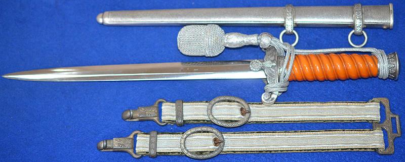 GERMAN ARMY OFFICERS DAGGER BY WKC COMPLETE WITH HANGERS AND KNOT.