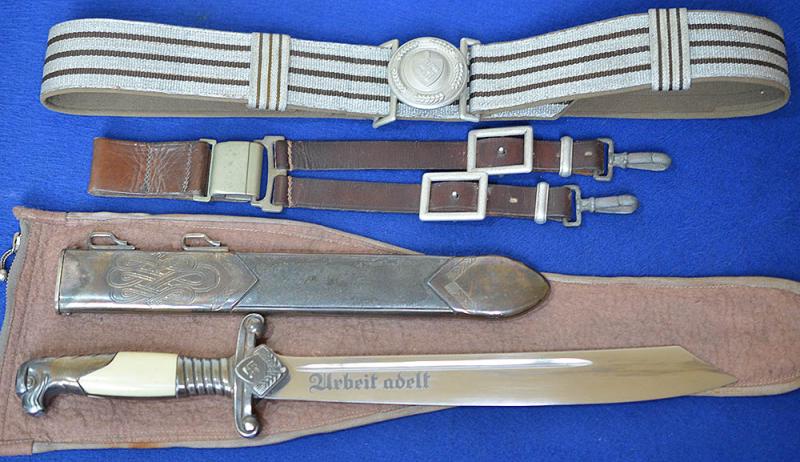 RAD OFFICERS DAGGER BY EICKHORN NAMED TO THE ORIGINAL OWNER, COMPLETE WITH STRAPS, BELT LOOP, CLOTH ISSUE BAG AND THE OFFICERS BROCADE BELT.