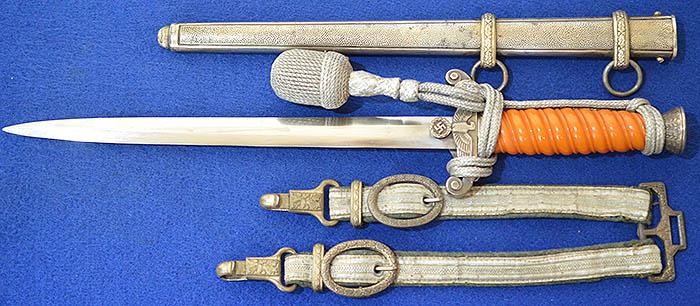 GERMAN ARMY OFFICERS DAGGER 1935 MODEL BY HORSTER COMPLETE WITH HANGERS AND KNOT.