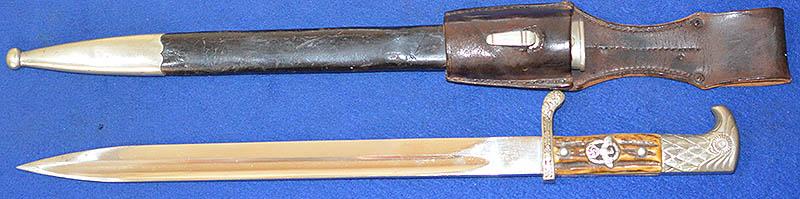 THIRD REICH POLICE BAYONET BY WAYERSBERG WITH MATCHING ISSUE NUMBERS AND FROG HANGER.