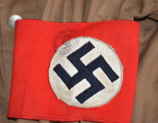 THIRD REICH POLITICAL LEADERS ORTSGRUPPE BROWN SHIRT COMPLETE WITH INSIGNIA.
