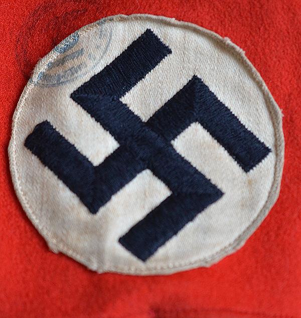 THIRD REICH POLITICAL LEADERS ORTSGRUPPE BROWN SHIRT COMPLETE WITH INSIGNIA.