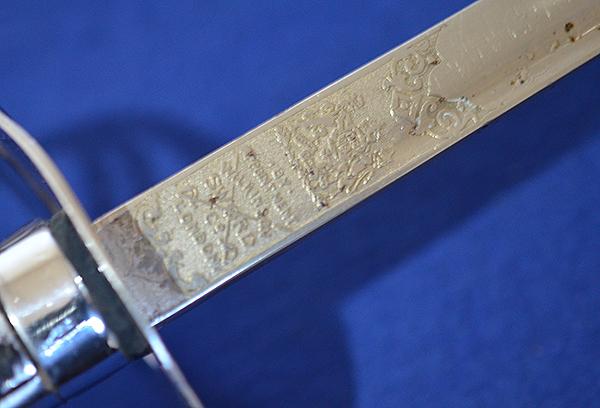 BRITISH 1930'S MINIATURE ARMY OFFICERS SWORD BY WILKINSON OF SUPERB QUALITY.