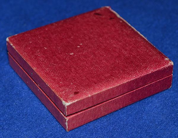 NSDAP 1934 COMEMORATIVE PLAQUETTE FOR THE NURNBERG RALLY COMPETITIONS WITH ORIGINAL PRESENTATION BOX.