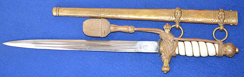 GERMAN 1ST MODEL NAVAL OFFICERS DAGGER BY WKC WITH ISSUE STAMPS AND GOLD KNOT.