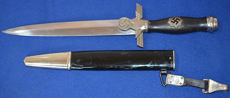 RLB 2ND MODEL MANS DAGGER COMPLETE WITH HANGER.