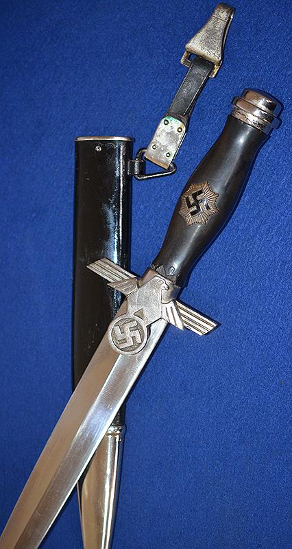 RLB 2ND MODEL MANS DAGGER COMPLETE WITH HANGER.