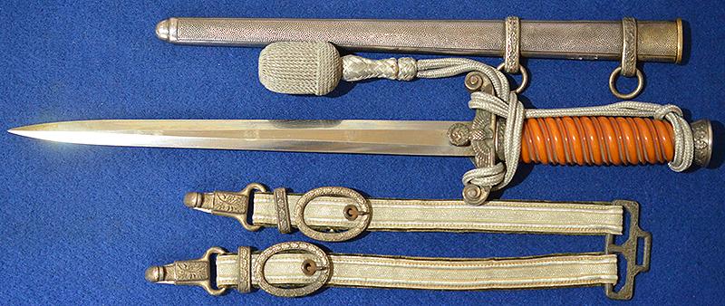 ARMY OFFICERS DAGGER BY EICKHORN COMPLETE WITH STRAP AND KNOT, MINT CONDITION.