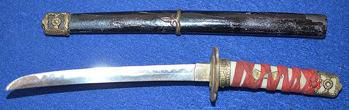MINIATURE JAPANEASE SWORD AND SCABBARD.