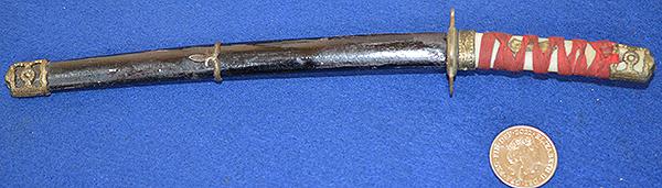 MINIATURE JAPANEASE SWORD AND SCABBARD.
