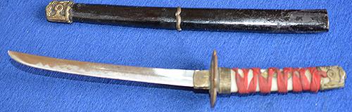 MINIATURE JAPANEASE SWORD AND SCABBARD.