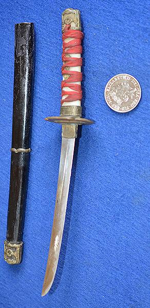 MINIATURE JAPANEASE SWORD AND SCABBARD.