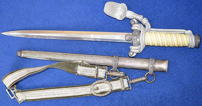 THIRD REICH ARMY OFFICERS DAGGER BY HOLLER COMPLETE WITH STRAPS AND KNOT.