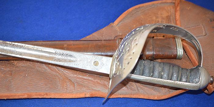 BRITISH WW1 ARMY OFFICERS SWORD WITH ORIGINAL LEATHER STORAGE BAG.