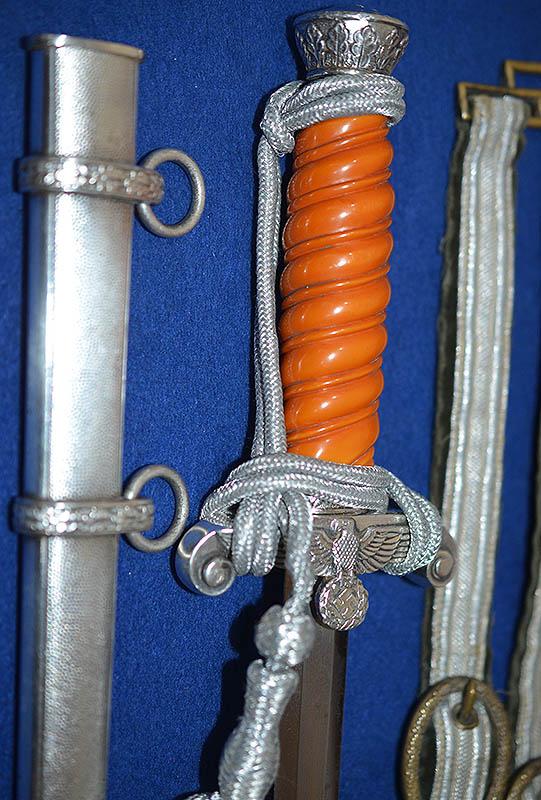GERMAN ARMY OFFICER DAGGER 1935 MODEL BY HOLLER COMPLETE WITH STRAPS AND KNOT.