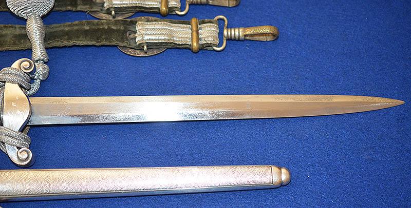 GERMAN ARMY OFFICER DAGGER 1935 MODEL BY HOLLER COMPLETE WITH STRAPS AND KNOT.